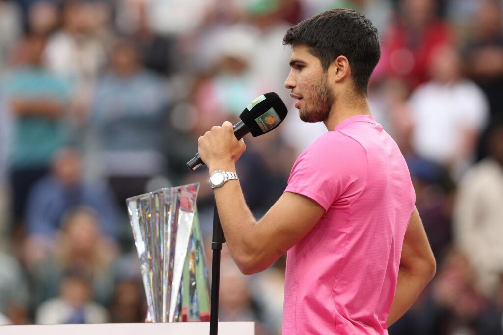 Jannik Sinner celebrating with trophy after Indian Wells 2026 final win vs Daniil Medvedev on Court 1