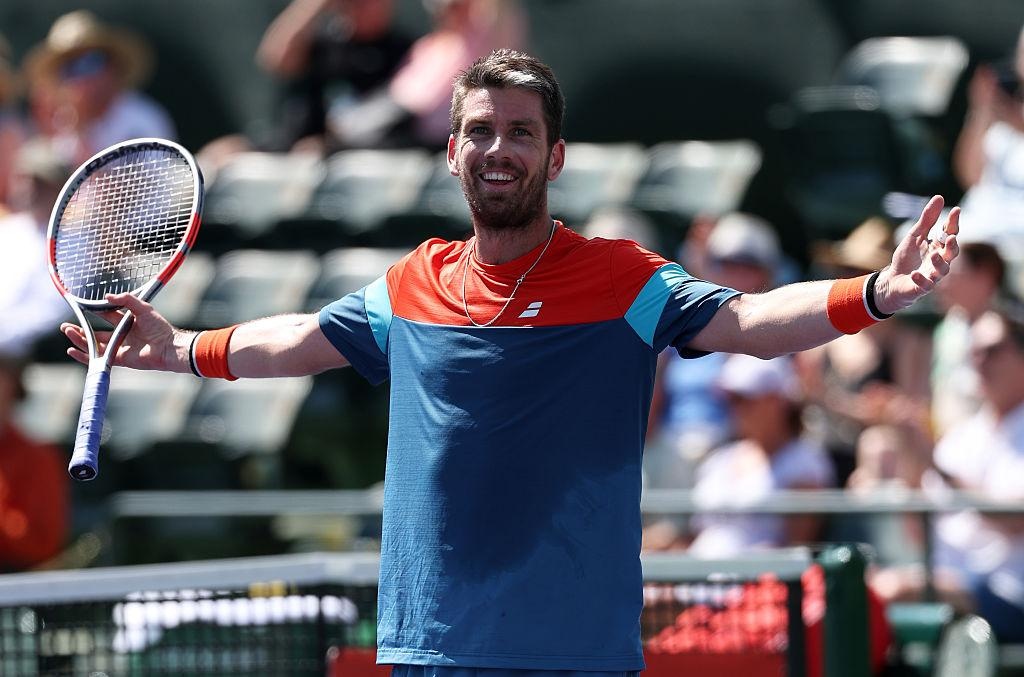 Carlos Alcaraz hitting a forehand during Indian Wells 2026 quarterfinal vs Cameron Norrie on Court 1